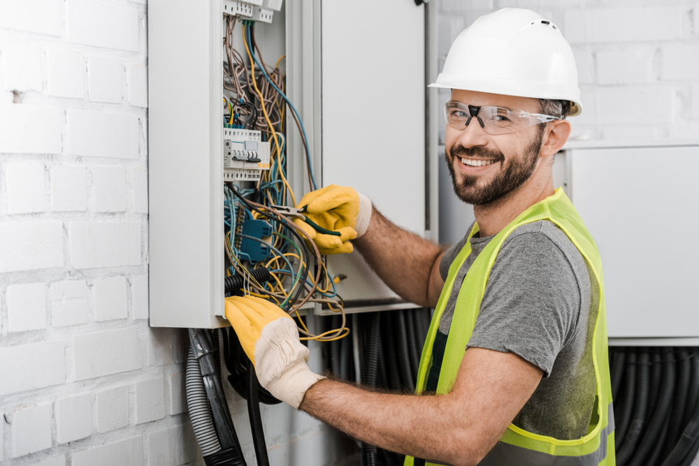 electrician-working-on-electrical-panel-circuit-breaker-box